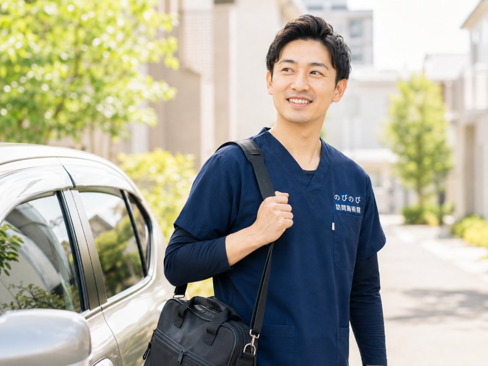 社用車で移動する施術者